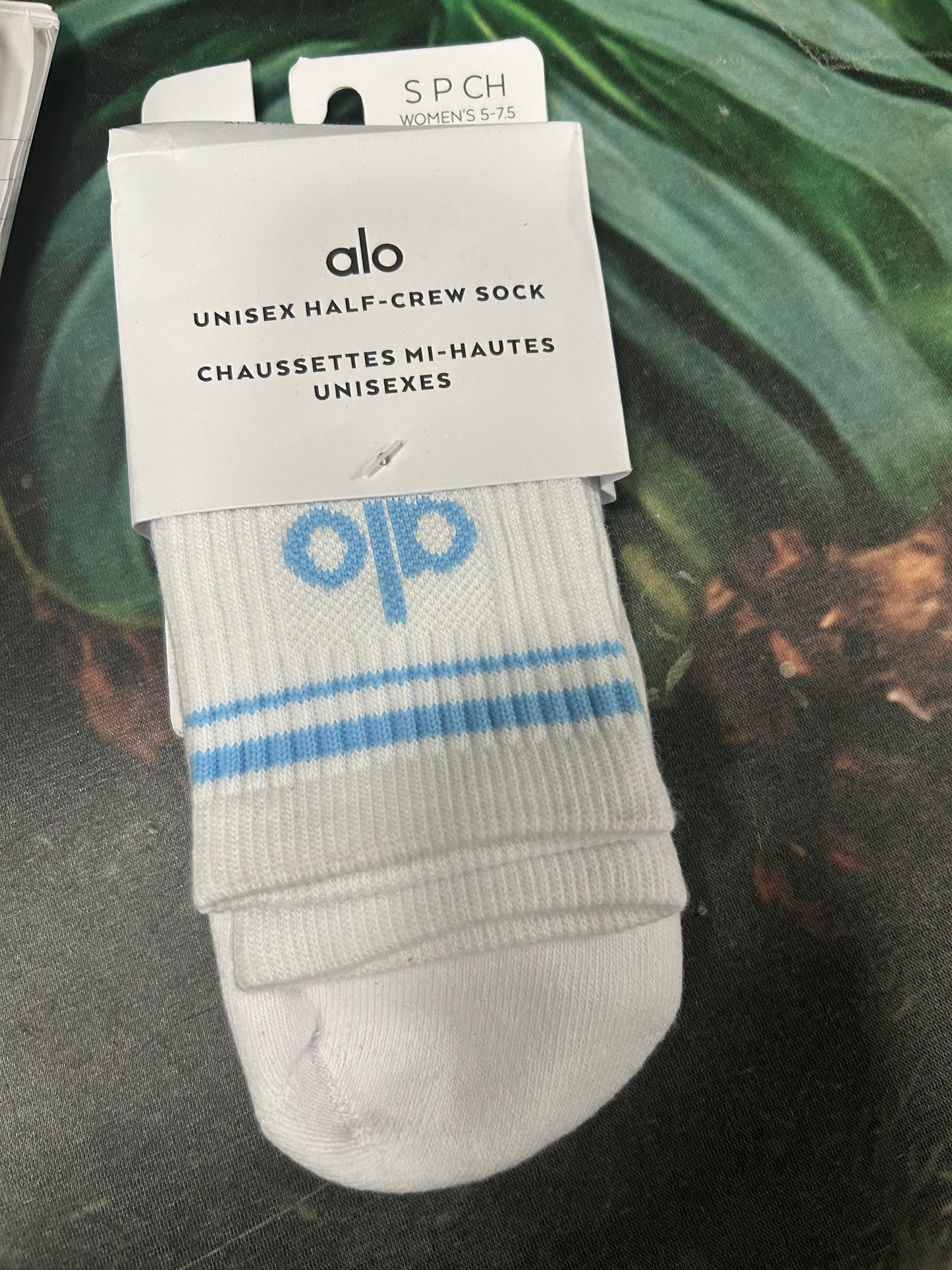 White and blue Alo socks